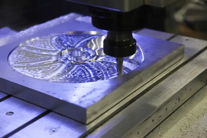 shaping metal with CNC machine at Seeb Academy
